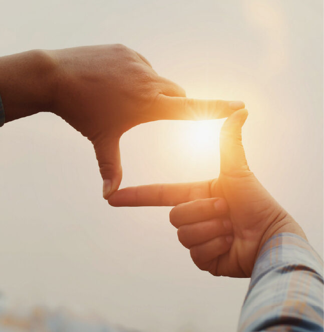 Fingers in front of sun